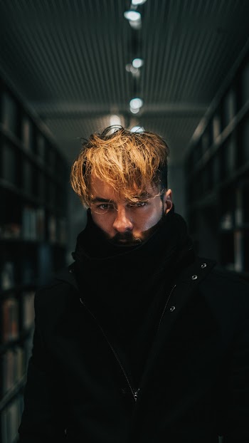 Man Wearing Black Zip-up Jacket