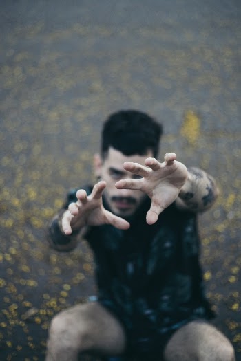 Man Wearing Black Zip-up Jacket