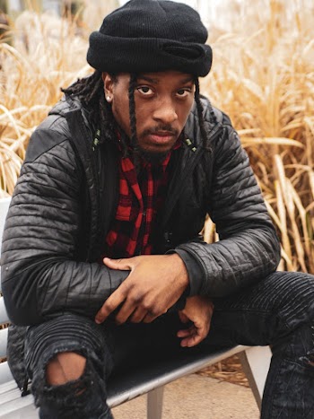Man Wearing Black Zip-up Jacket and Black Knit Cap