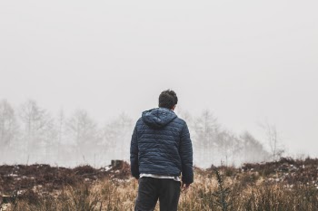 Man Wearing Blue Bubble Hooded Jacket