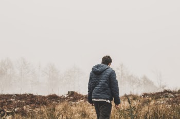 Man Wearing Blue Bubble Jacket