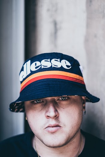 Man Wearing Blue Bucket Hat