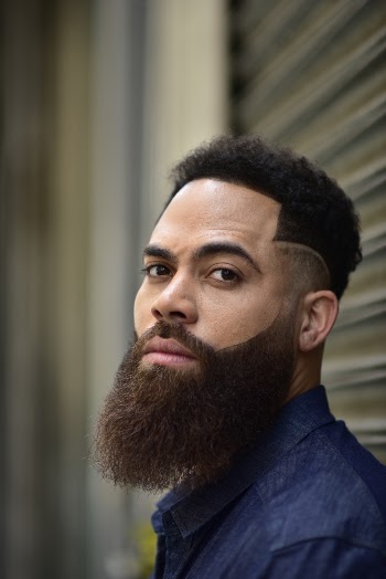 Man Wearing Blue Collared Shirt