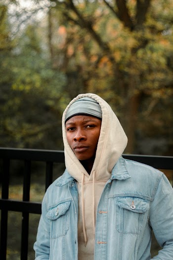 Man Wearing Blue Denim Jacket