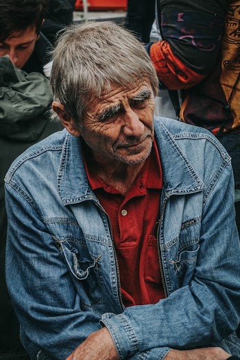Man Wearing Blue Denim Jacket