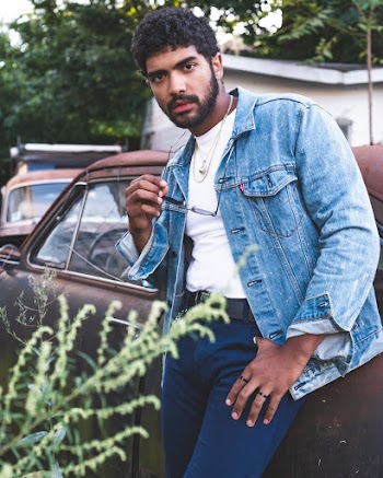 Man Wearing Blue Denim Jacket