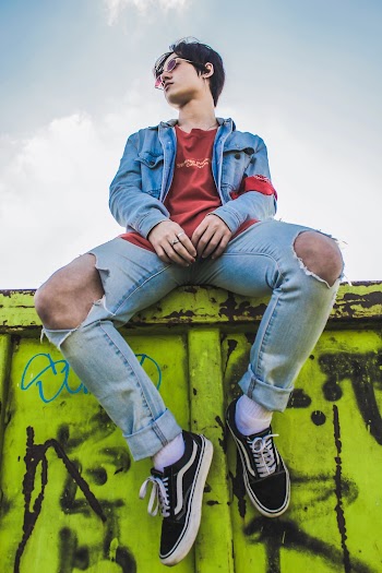 Man Wearing Blue Denim Jacket