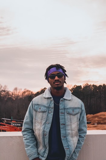 Man Wearing Blue Denim Jacket