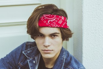 Man Wearing Blue Denim Jacket and Red Bandanna