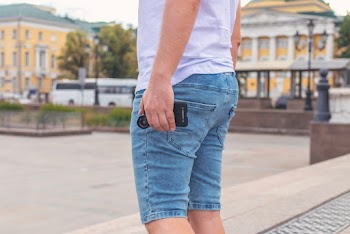 Man Wearing Blue Denim Shorts