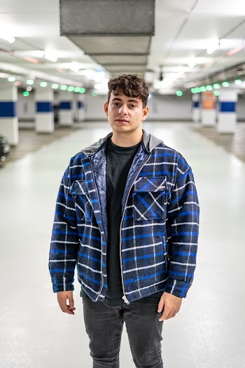 Man Wearing Blue Plaid Jacket