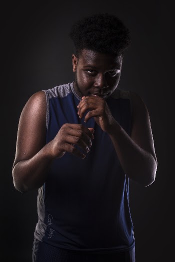 Man Wearing Blue Sleeveless Top