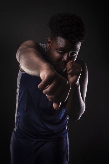 Man Wearing Blue Sleeveless Top 
