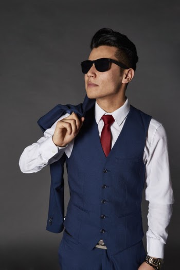 Man Wearing Blue Vest Coat and White long-sleeved Shirt
