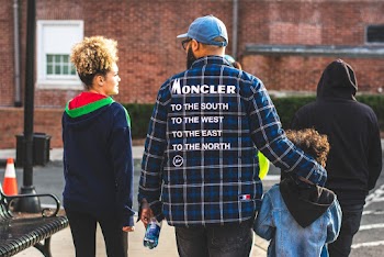 Man Wearing Blue, White, and Black Plaid Moncler Dress Shirt Showing Back