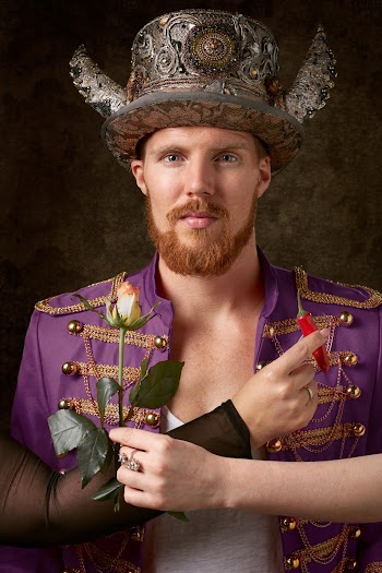 Man Wearing Brass-colored Hat