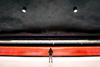 Man Wearing Brown Backpack