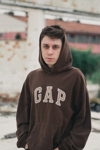 Man Wearing Brown Gap Hoodie