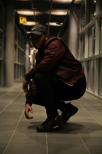 Man Wearing Brown Jacket