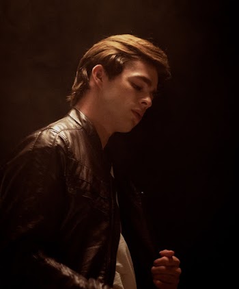 Man Wearing Brown Jacket