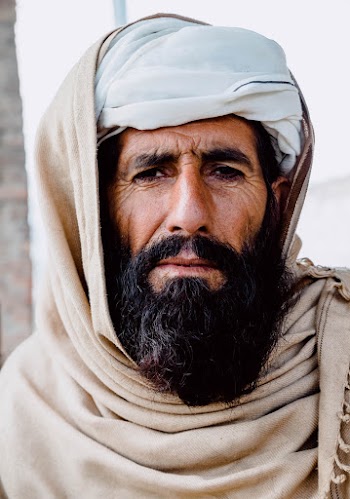 Man Wearing Brown Shawl