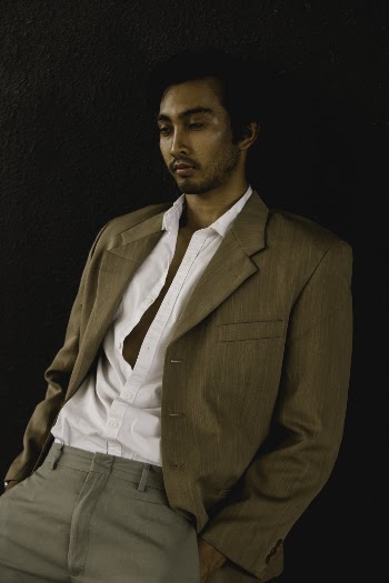 Man Wearing Brown Suit Jacket