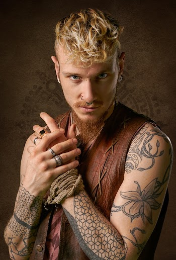 Man Wearing Brown Vest