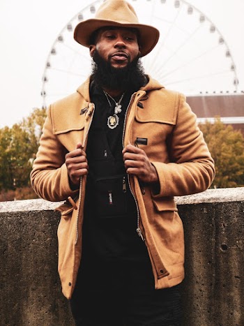 Man Wearing Brown Zip-up Hoodie 