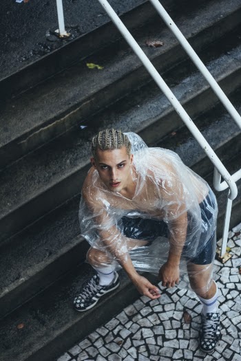 Man Wearing Clear Rain Coat