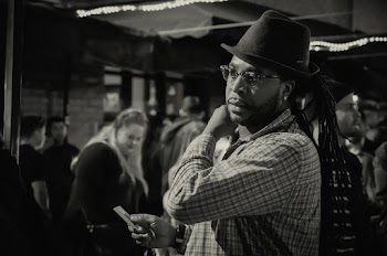 Man Wearing Dress Shirt and Fedora Hat