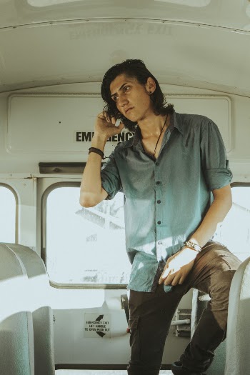 Man Wearing Dress Shirt Standing Inside Vehicle