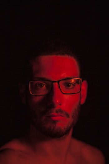 Man Wearing Eyeglasses Taking Selfie