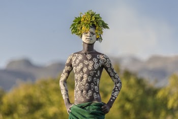 Man Wearing Flower Headdress