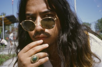 Man Wearing Gold Framed Ray-ban Sunglasses