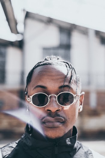 Man Wearing Gold-framed Sunglasses