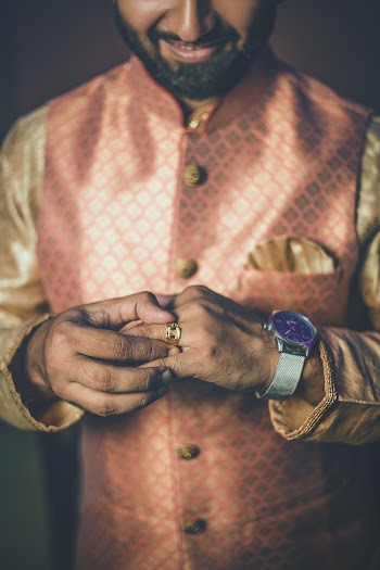 Man Wearing Gold Ring