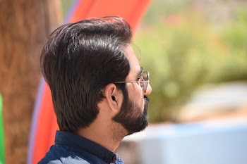 Man Wearing Gold Temple Aviator-style Sunglasses Selective Focus Photography