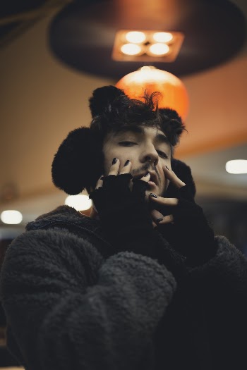 Man Wearing Gray Coat