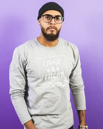 Man Wearing Gray Crew-neck Long-sleeved T-shirt and Cap