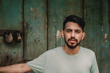 Man Wearing Gray Crew-neck T-shirt