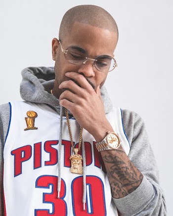 Man Wearing Gray Hoodie Jacket and White Nba Detroit Piston Jersey Shirt