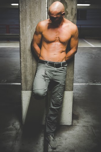 Man Wearing Gray Pants and Black Leather Belt