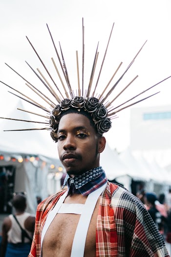Man Wearing Gray Rod Floral Headdress