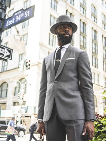 Man Wearing Gray Suit With Hat