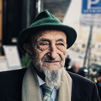 man wearing green hat during daytime