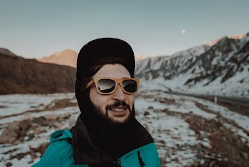 Man Wearing Green Jacket