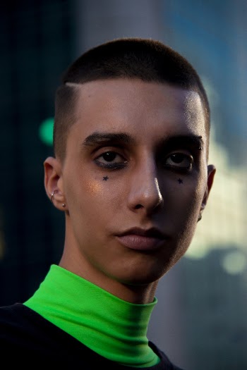 Man Wearing Green Turtle Neck Top