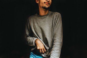 Man Wearing Grey Long-Sleeved Shirt
