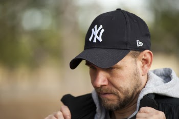 Man Wearing New York Yankees Cap