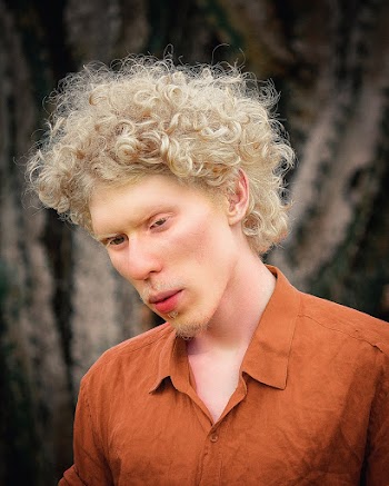 Man Wearing Orange Button-up Collared Shirt